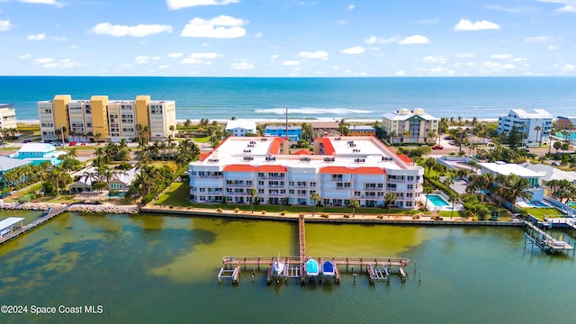 drone / aerial view with a water view