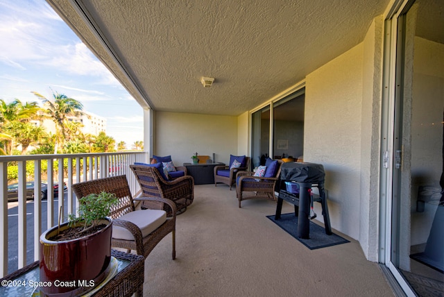 balcony with an outdoor hangout area