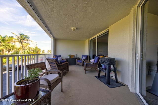 3360 S Atlantic Ave Unit 212, Cocoa Beach, FL 32931 - balcony featuring outdoor lounge area