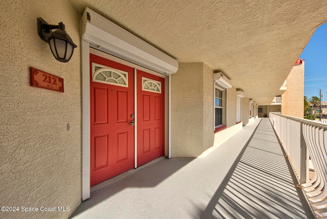 doorway to property with a balcony