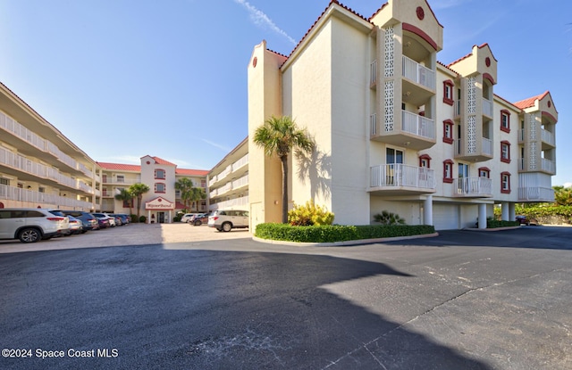 3360 S Atlantic Ave Unit 212, Cocoa Beach, FL 32931 - view of apartment building / complex