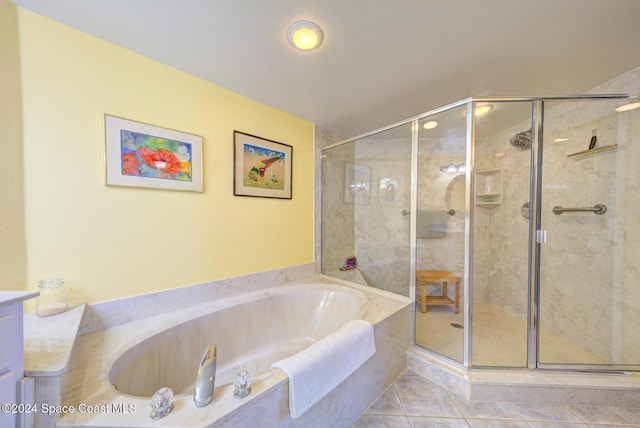 3360 S Atlantic Ave Unit 212, Cocoa Beach, FL 32931 - full bathroom featuring a stall shower, a bath, tile patterned floors, and vanity