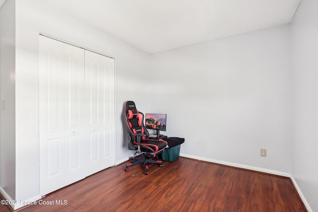 sitting room with dark hardwood / wood-style floors