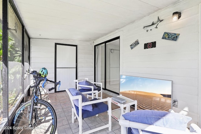 sunroom / solarium with lofted ceiling