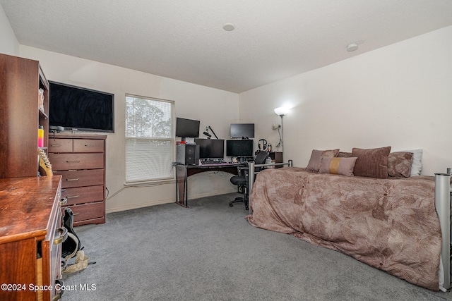 bedroom with light colored carpet