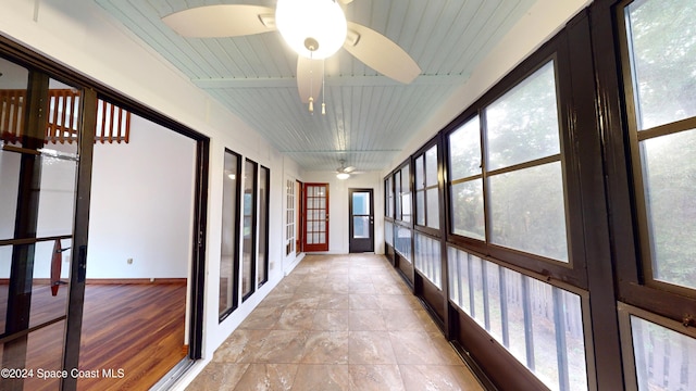 753 Greenwood Manor Cir Unit 15B, West Melbourne, FL 32904 - unfurnished sunroom featuring plenty of natural light and baseboards