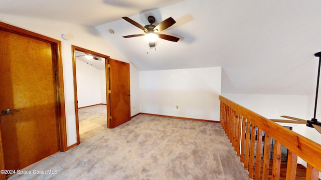 753 Greenwood Manor Cir Unit 15B, West Melbourne, FL 32904 - bonus room with ceiling fan, carpet, vaulted ceiling, and baseboards