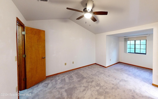 753 Greenwood Manor Cir Unit 15B, West Melbourne, FL 32904 - unfurnished room with lofted ceiling, a ceiling fan, carpet flooring, and baseboards
