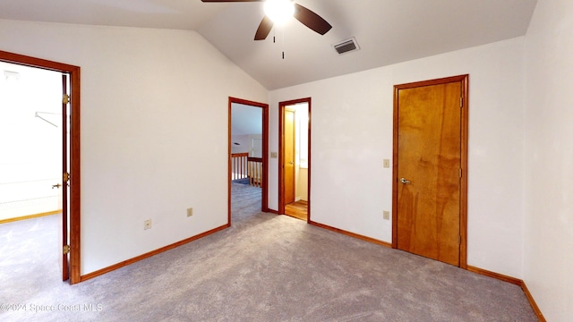 753 Greenwood Manor Cir Unit 15B, West Melbourne, FL 32904 - unfurnished bedroom featuring lofted ceiling, carpet, baseboards, and ceiling fan