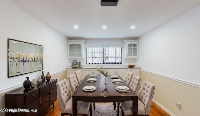 753 Greenwood Manor Cir Unit 15B, West Melbourne, FL 32904 - dining space featuring wood finished floors, recessed lighting, and baseboards