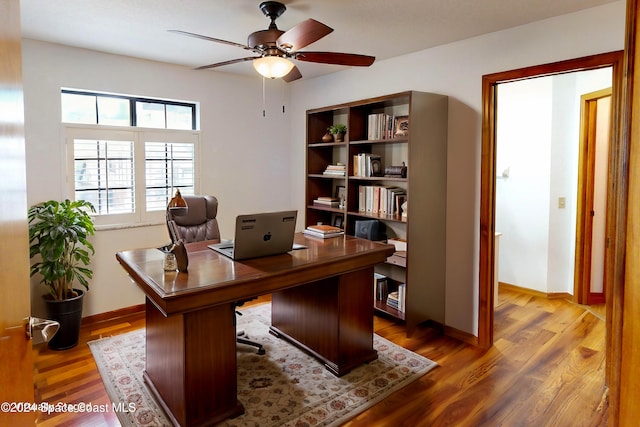 office featuring ceiling fan and wood-type flooring