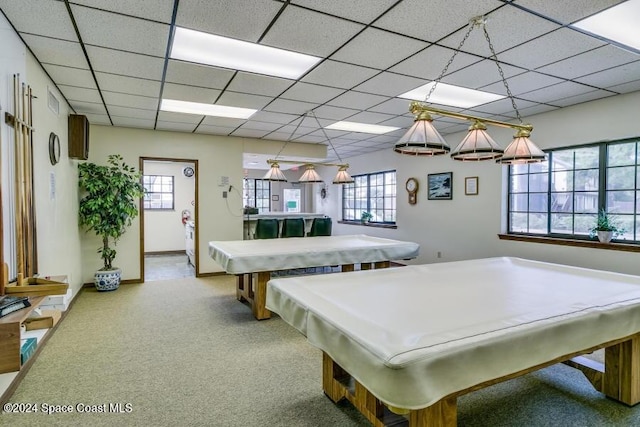 game room featuring carpet flooring, pool table, and a drop ceiling