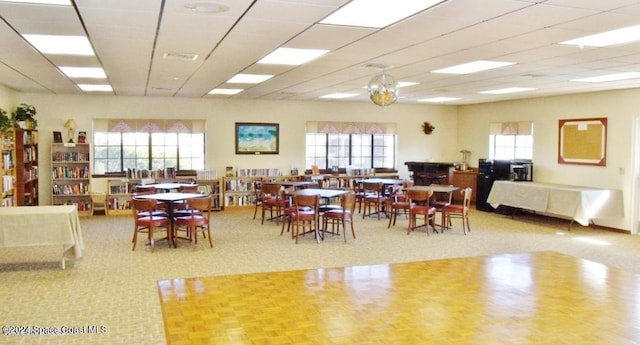 753 Greenwood Manor Cir Unit 15B, West Melbourne, FL 32904 - dining room with healthy amount of natural light and a paneled ceiling
