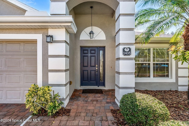 property entrance featuring a garage