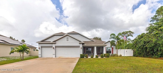 craftsman house with a garage and a front yard