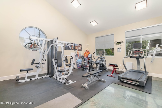 workout area featuring lofted ceiling