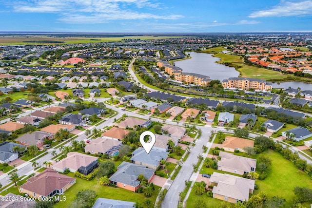 aerial view featuring a water view