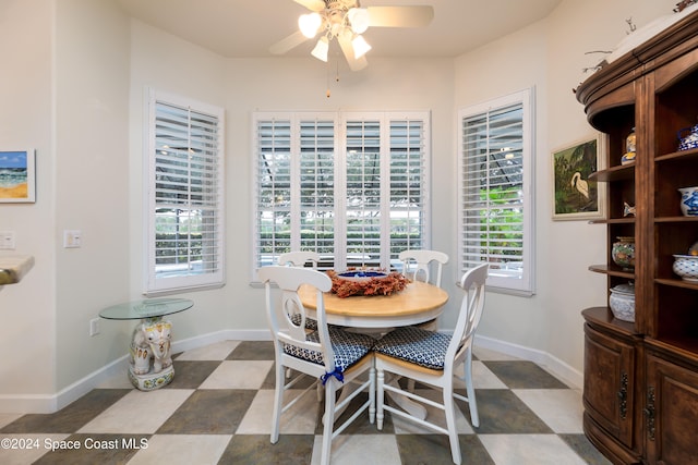 dining space with ceiling fan