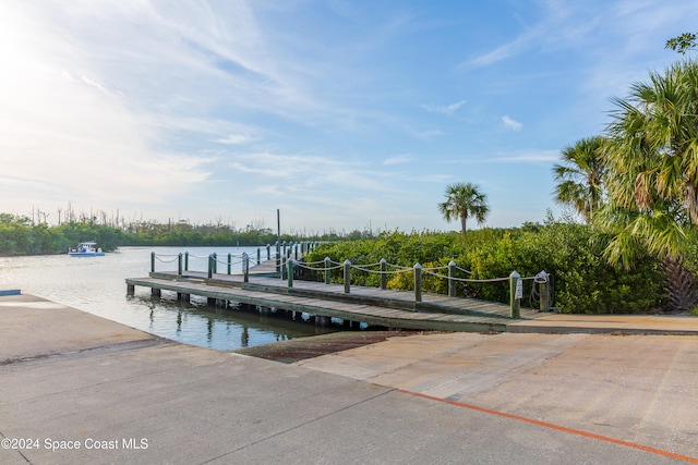 dock area featuring a water view