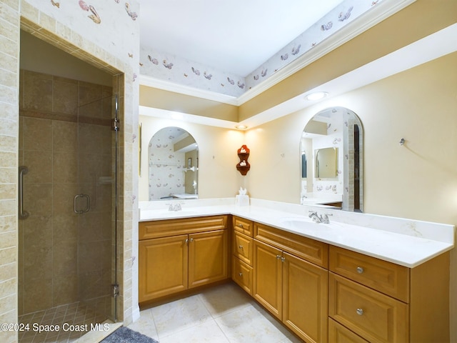 bathroom featuring vanity, walk in shower, and tile patterned flooring