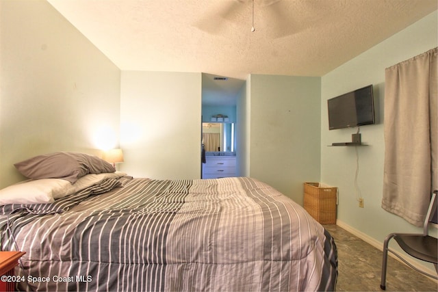 bedroom featuring a textured ceiling