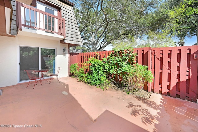 view of patio / terrace with a balcony