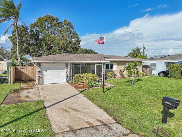 single story home with a front lawn and a garage