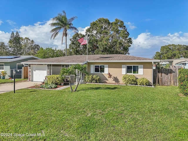 ranch-style house with a front lawn and a garage