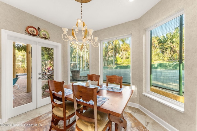 dining room with a chandelier