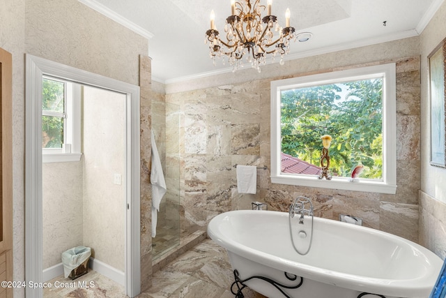 bathroom featuring an inviting chandelier, shower with separate bathtub, a healthy amount of sunlight, and crown molding