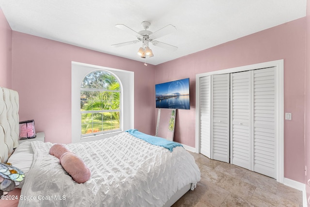 bedroom with a closet and ceiling fan