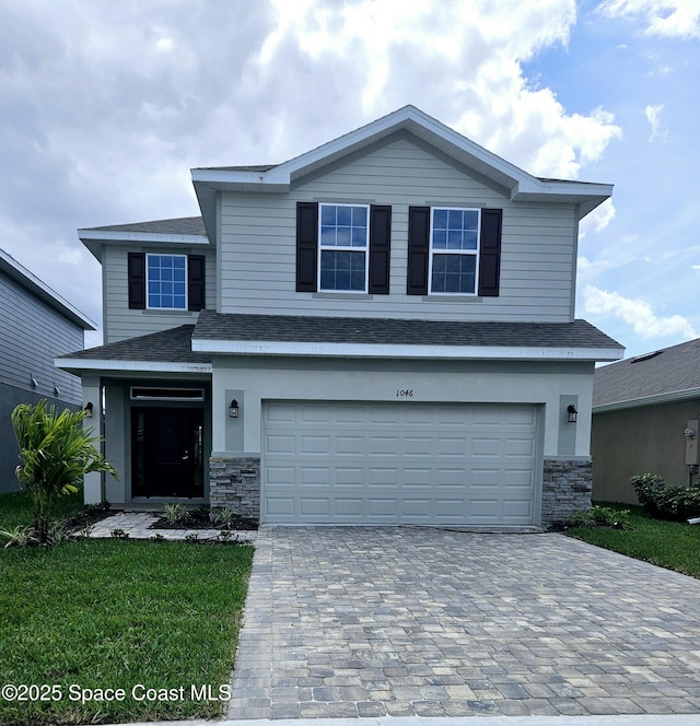 view of front property with a garage