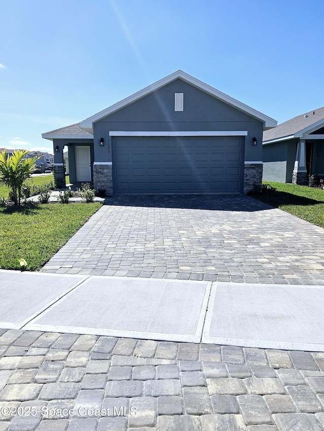 single story home featuring a garage