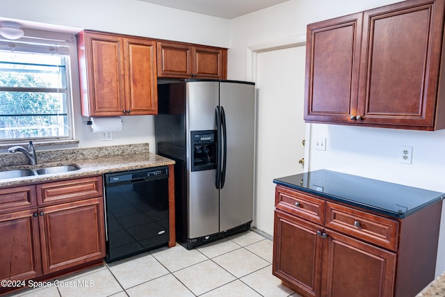 kitchen featuring dishwasher, sink, light tile patterned flooring, and stainless steel fridge with ice dispenser