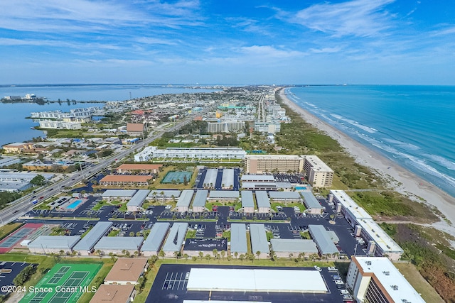 bird's eye view with a beach view and a water view