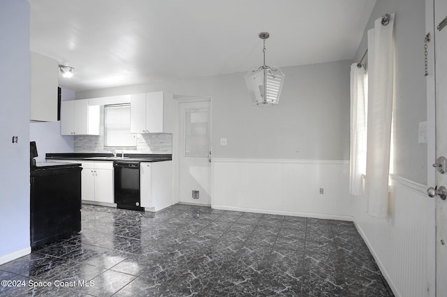 kitchen featuring white cabinetry, black appliances, sink, and decorative light fixtures