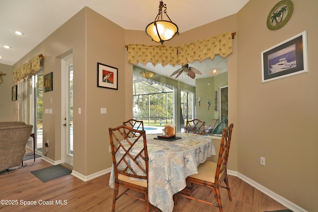 dining area featuring hardwood / wood-style flooring