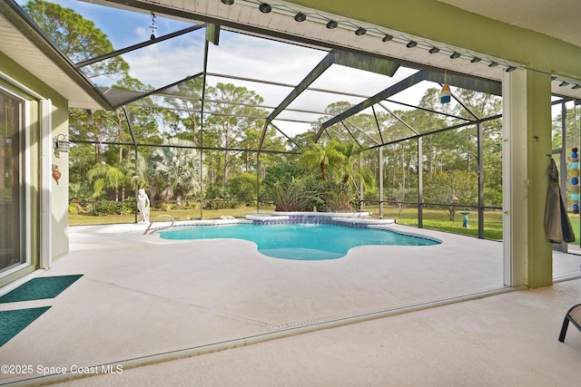 view of swimming pool featuring a patio and glass enclosure