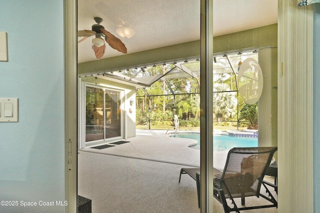 interior space featuring ceiling fan