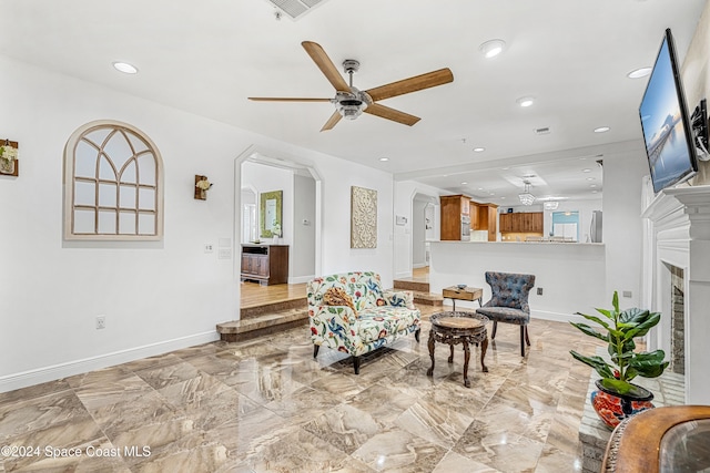 living room with ceiling fan