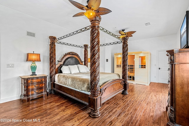 bedroom featuring dark wood-type flooring and ceiling fan