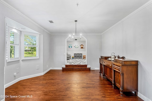 dining area with crown molding, a notable chandelier, and dark hardwood / wood-style floors