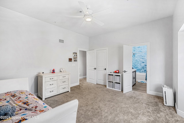 carpeted bedroom with ceiling fan