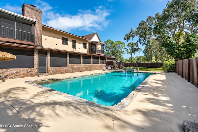 view of pool with a patio area