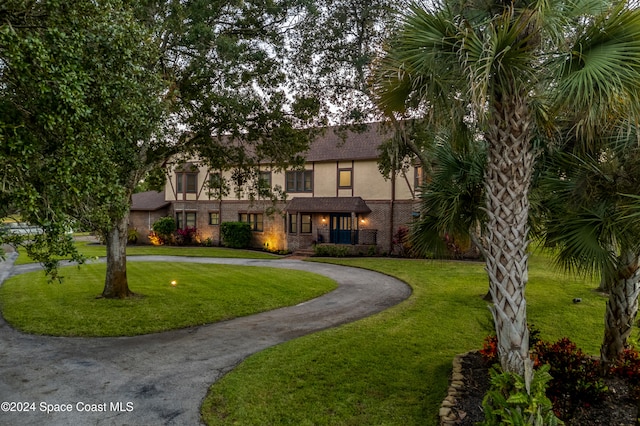 view of front of property with a front lawn