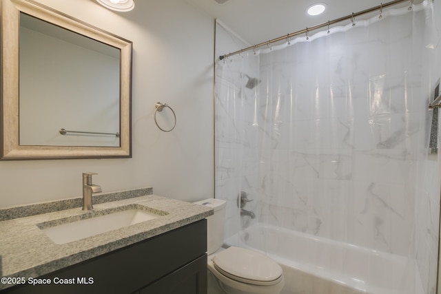 full bathroom with shower / bath combo with shower curtain, toilet, and vanity