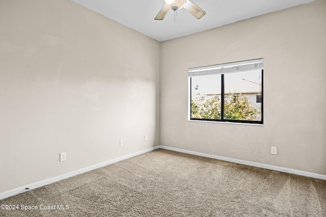 unfurnished room with carpet flooring