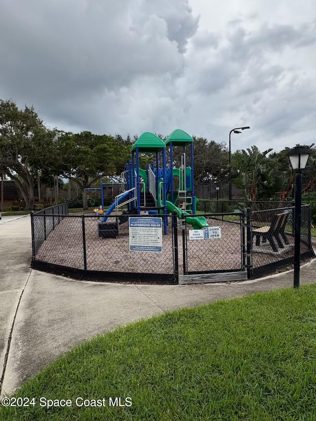 view of playground featuring a yard