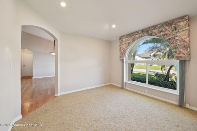 empty room with carpet flooring