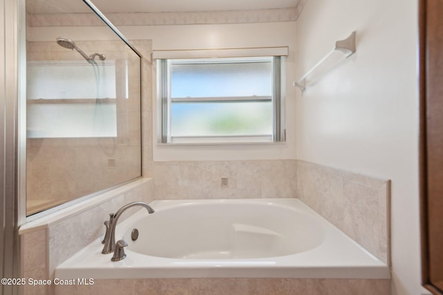 bathroom featuring a tub to relax in